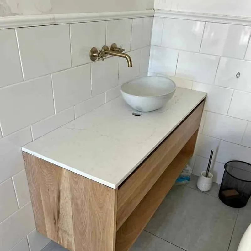 Oak floating vanity in a customer’s home